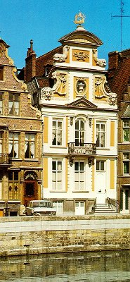 An example of one of the many beautiful buildings in Ghent, in a style which becomes quickly familiar, is the Guild Hall of non-independent shippers. It has a baroque facade which dates back to 1739, and has a sailing ship as its weathercock.